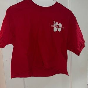 A red cropped Trader Joe’s shirt
